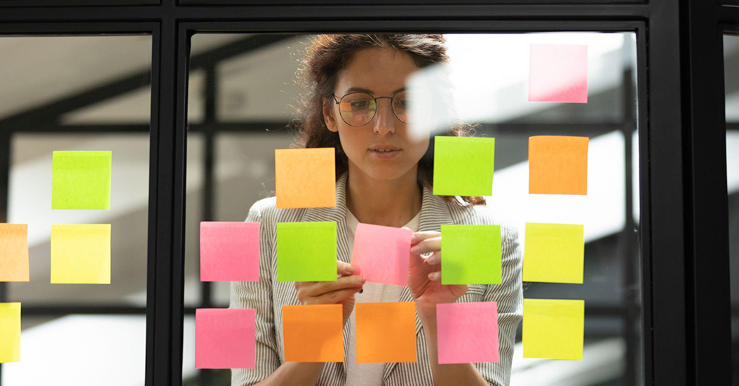 Office walls covered in post-it notes must be work of mad genius